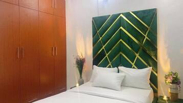 Economy Apartment, Balcony, City View | Desk, laptop workspace, blackout drapes, soundproofing