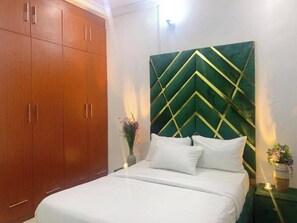 Economy Apartment, Balcony, City View | Desk, laptop workspace, blackout drapes, soundproofing - Oscar's Apartment (Abuja)