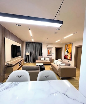 Standard Apartment, Balcony, City View | Living area - Jim Cossy Shortlets (Abuja)