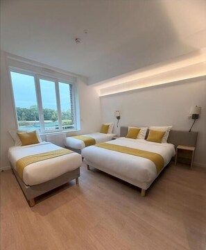 Habitación cuádruple, vista al jardín | Wifi gratis 