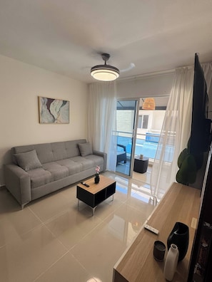 Apartamento, 3 quartos, vista para o jardim | Área de estar
