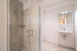 Double Room, Garden View | Bathroom | Shower, hair dryer, towels, soap