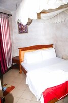 Deluxe Single Room | Free WiFi, bed sheets