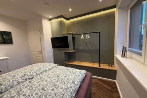 2 habitaciones, tabla de planchar con plancha, wifi y ropa de cama 