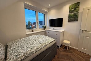 2 slaapkamers, een strijkplank/strijkijzer, wifi, beddengoed