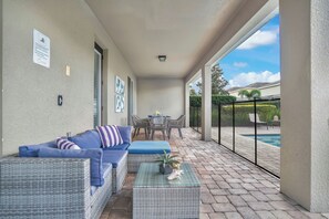 Outdoor dining - Game Room, Vegas Bedroom, Resort-style Pool, Table Tennis + Foosball Table: Epic Getaway (Kissimmee)