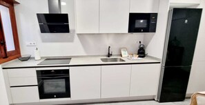 Private kitchen - APARTMENT LA ZANCUDA BLANCA (Alcalá de Henares)