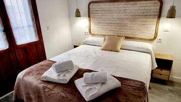 Fer et planche à repasser, draps fournis