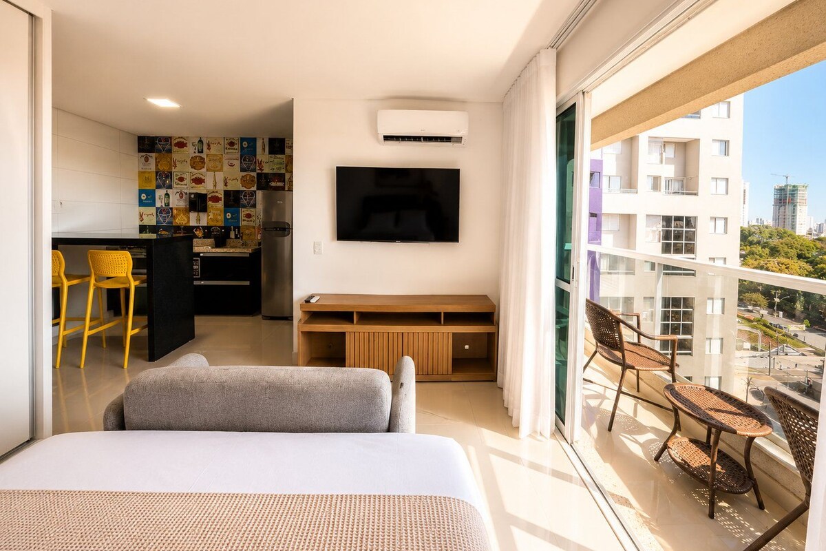 Traditional Apartment | Desk, laptop workspace, blackout curtains, iron/ironing board
