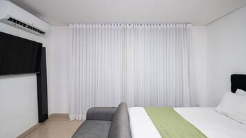 Traditional Apartment | Individually furnished, desk, laptop workspace, blackout drapes