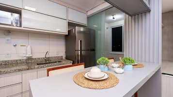 Exclusive Apartment | Private kitchen | Fridge, microwave, cookware/dishes/utensils, cleaning supplies