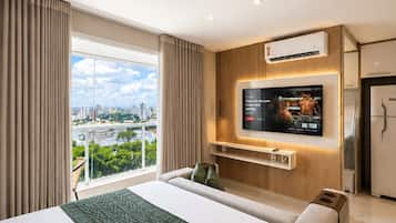 Apartment, 1 Queen Bed | Individually furnished, desk, laptop workspace, blackout curtains