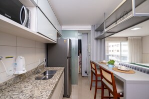 Exclusive Apartment | Private kitchen | Fridge, microwave, cookware/dishes/utensils, cleaning supplies