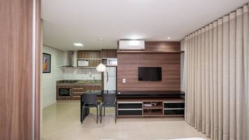 Traditional Apartment | Private kitchen | Fridge, microwave, cookware/dishes/utensils, cleaning supplies