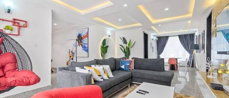 Appartement, balcon, vue ville | Coin séjour