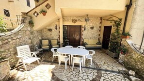 Outdoor dining - A place to relax body and mind--and thus nourish the spirit (Umbria)