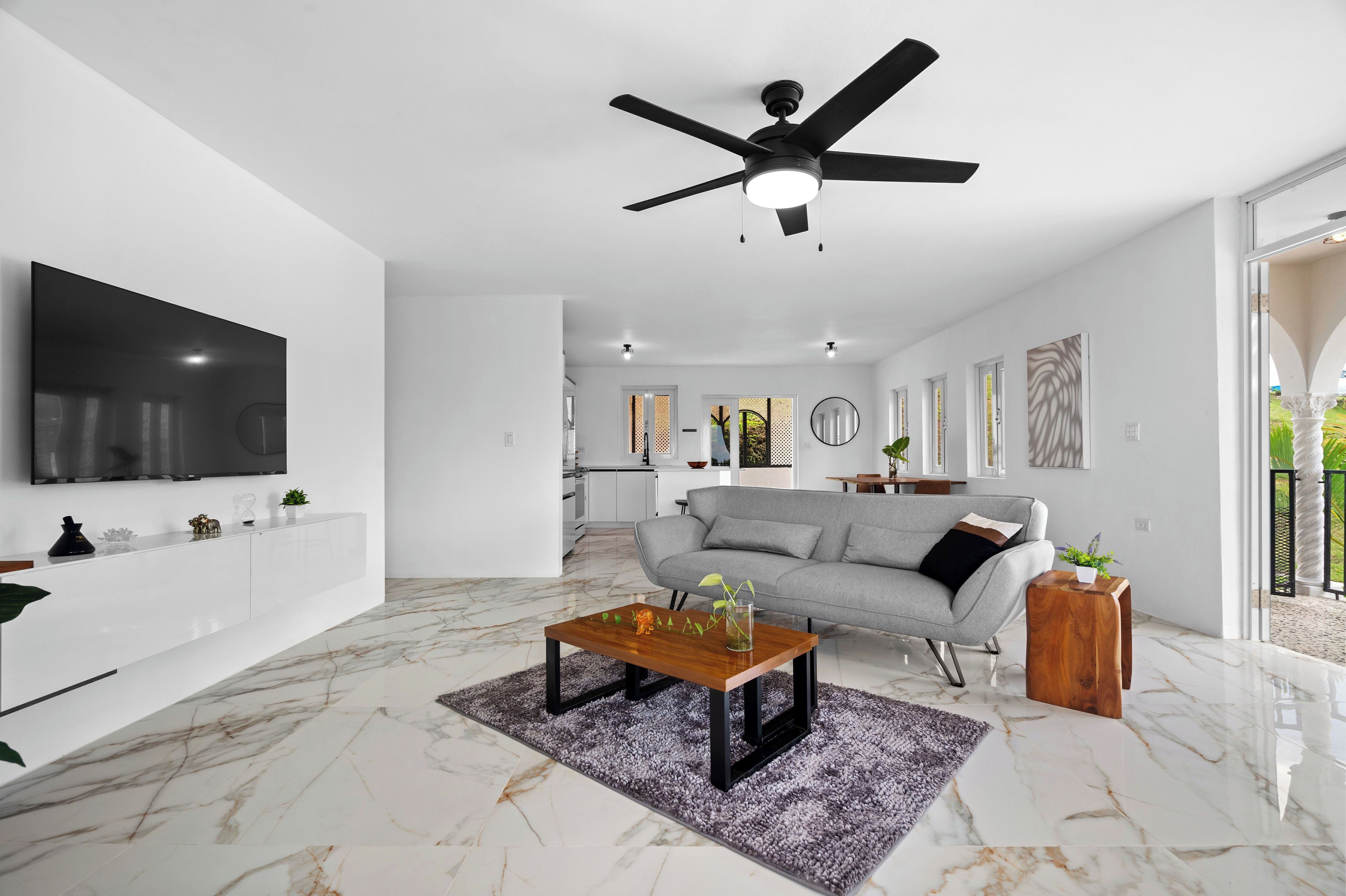 Deluxe House | Living area | 32-inch flat-screen TV with digital channels