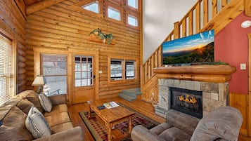 Una televisión, una chimenea, videojuegos