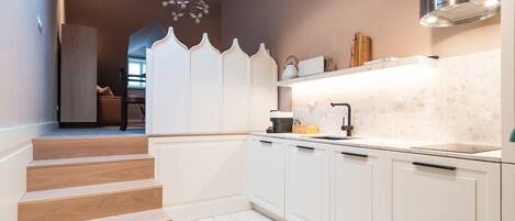 Fridge, stovetop, dishwasher, electric kettle