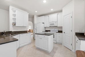Maison, Plusieurs lits (Palm Haven) | Cuisine privée | Un four, grille-pain