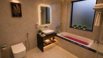 Separate bathtub and shower, rainfall showerhead, hair dryer, slippers