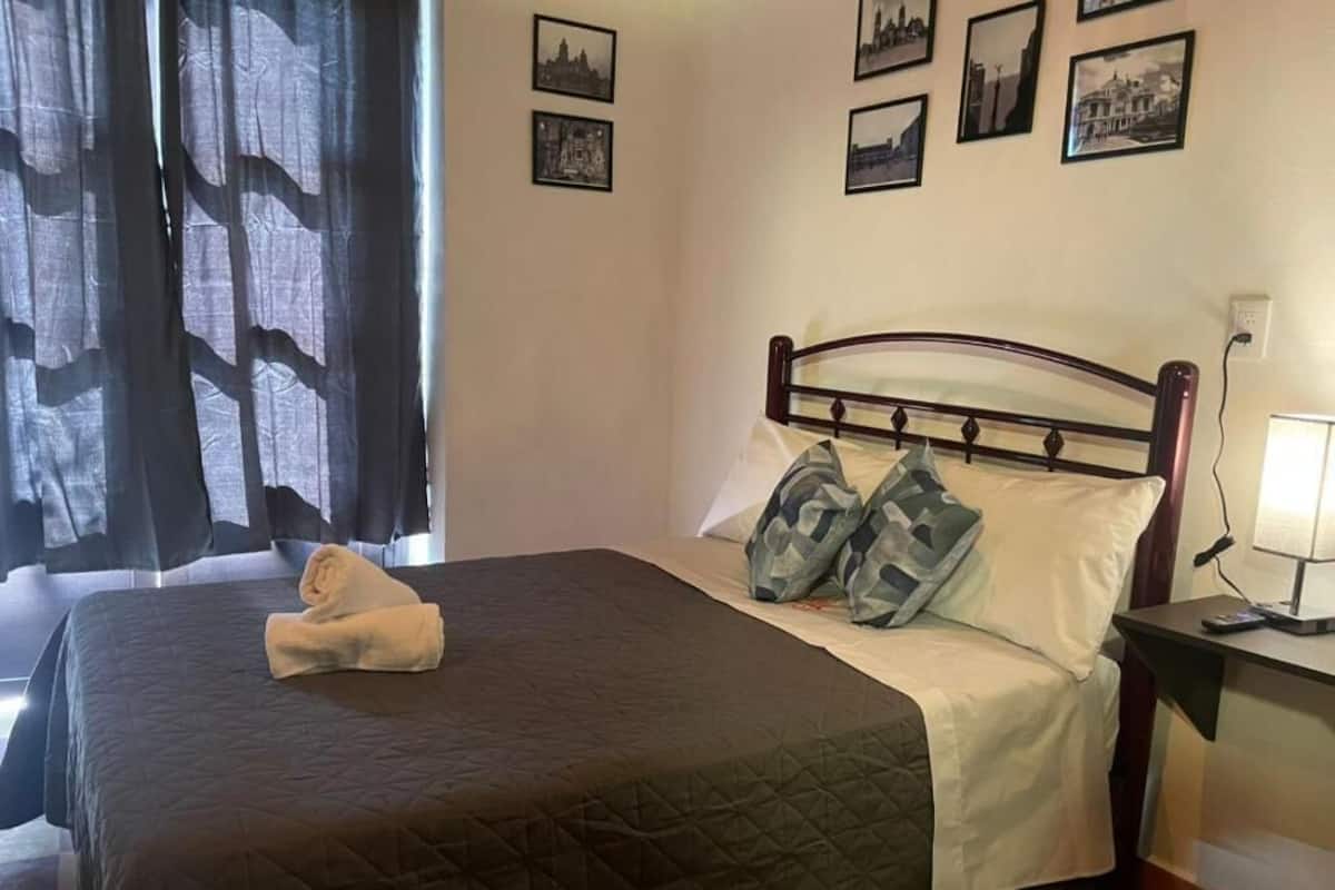 Quarto casal clássico, vista para a cidade