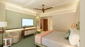 A hotel room with a bed, a TV, a desk, a chair, and a ceiling fan. - Olde Naples Hotel (Naples)