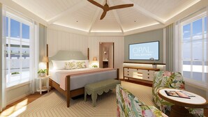 Een hotelkamer met een bed, een televisie, een bureau, een stoel en een raam.