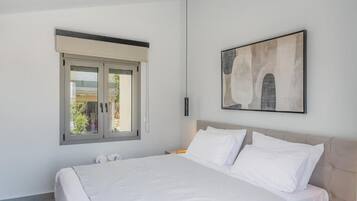 Deluxe Villa, Balcony, Pool View | In-room safe, blackout drapes, soundproofing, iron/ironing board