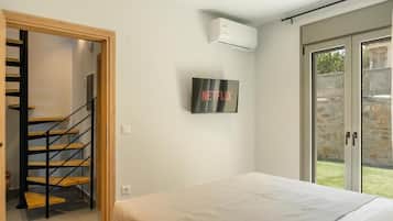 Deluxe Villa, Balcony, Pool View | In-room safe, blackout curtains, soundproofing, iron/ironing board