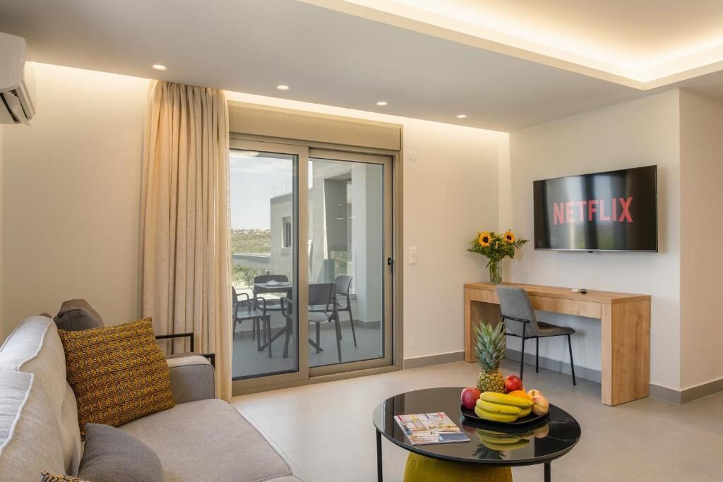 Deluxe Villa, Balcony, Pool View | Living area | Flat-screen TV