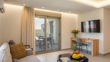 Deluxe Villa, Balcony, Pool View | Living area | Flat-screen TV