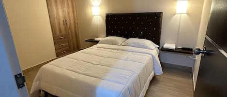 2 bedrooms, desk, iron/ironing board, travel cot