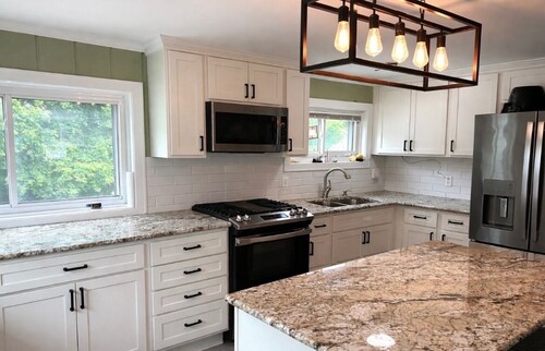 Family Retreat Near Lake Huron Sleeps 10 Game Room walkable to downtown & beach