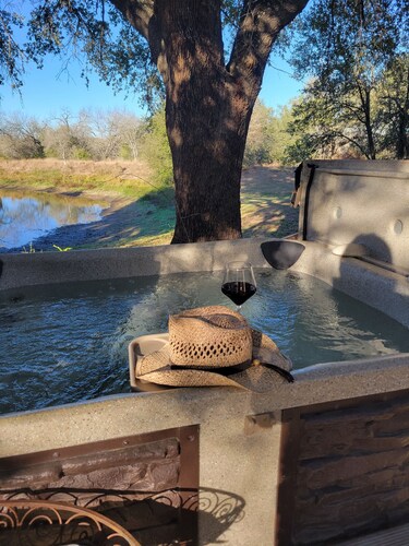 Country property, 3-bedroom/2-bath farmhouse on 4 acres. Minutes from downtown.