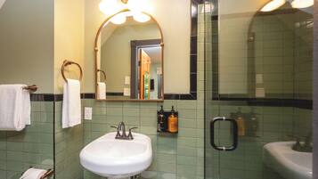 Family Room, Multiple Beds | Bathroom | Shower, hair dryer, towels, soap