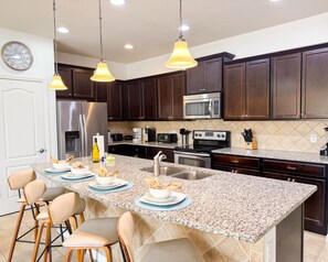 Fridge, microwave, oven, stovetop - Luxury Windsor Westside Townhome | Private Pool | Across Clubhouse | Near Disney (Kissimmee)
