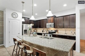 Fridge, microwave, oven, stovetop - Luxury Windsor Westside Townhome | Private Pool | Across Clubhouse | Near Disney (Kissimmee)