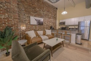 Living area - Stylish Exposed Brick 3BR! (Boston)