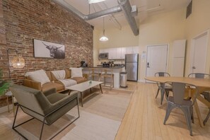 Living area - Stylish Exposed Brick 3BR! (Boston)