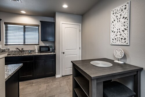 Sleek & Modern Triplex | Private Yard & Top Amenities