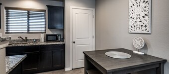 Sleek & Modern Triplex | Private Yard & Top Amenities