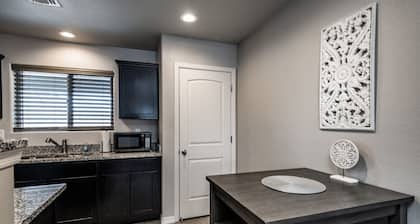 Sleek & Modern Triplex | Private Yard & Top Amenities