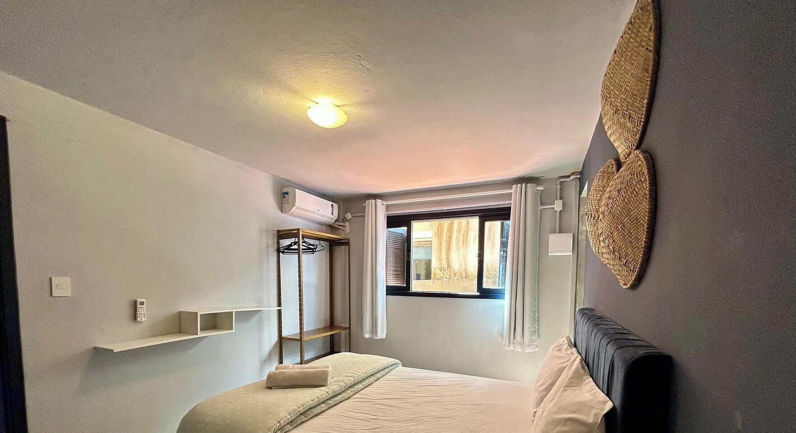 Suíte Lagoa da Conceição | Roupas de cama premium, individualmente decorados