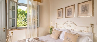 Elegant Tuscan Apartment with Fireplace and Countryside Views