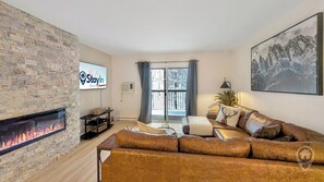 TV, fireplace - Kimberley Getaway: Ski-In/Out, Golf, Downtown (Kimberley)
