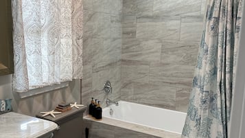 Hair dryer, towels, soap, toilet paper