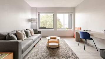 Deluxe Studio Suite, Canal View | Living area | Toys