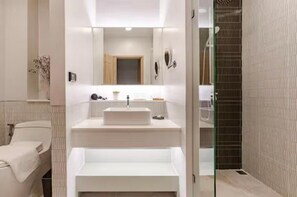 Deluxe Studio Suite, Canal View | Bathroom | Shower, free toiletries, hair dryer, slippers - BubbleHumble.Bkk (Bangkok)