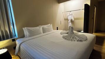 Family Apartment, City View | In-room safe, desk, laptop workspace, blackout curtains